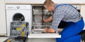 Appliance being repaired by professional